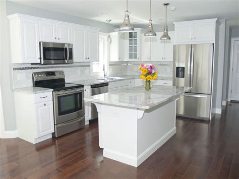 dark countertop with white cabinets stainless steel appliances|dark cabinets white quartz countertops.